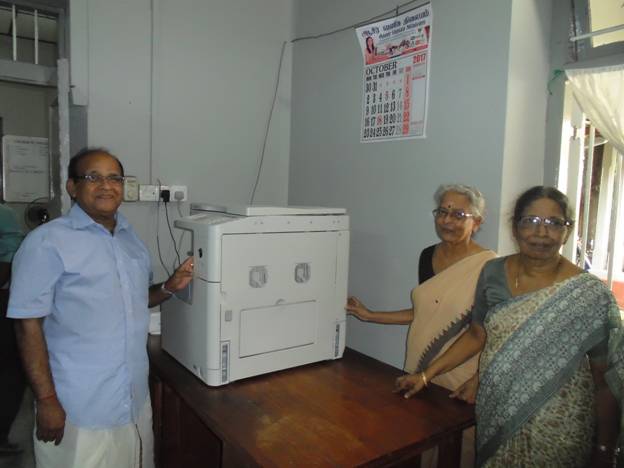Dr.V.Paramanathan donates a Photocopier